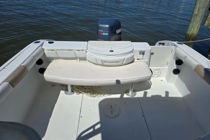 Slide: The Image of 2003 Seaswirl Striper 2301 Walkaround OB boat interior with Yamaha outboard motor. - 19