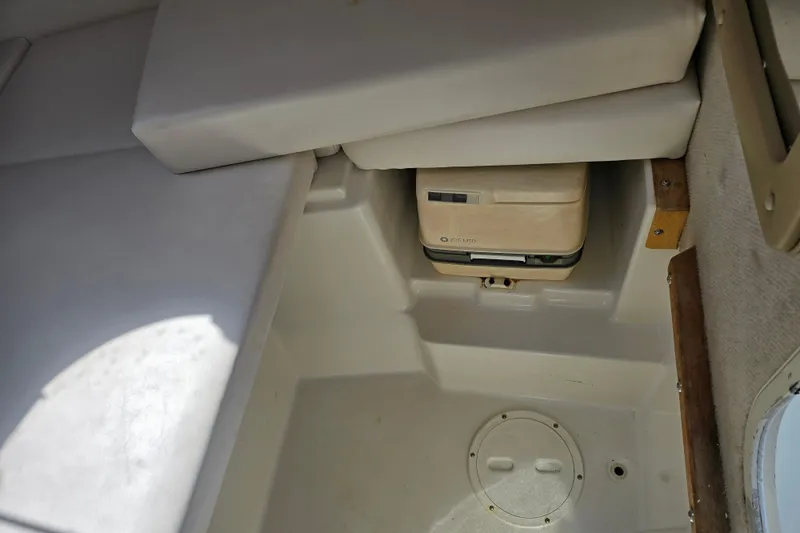 Slide: The Image of Interior cabin of 2003 Seaswirl Striper 2301 Walkaround OB with portable toilet. - 25