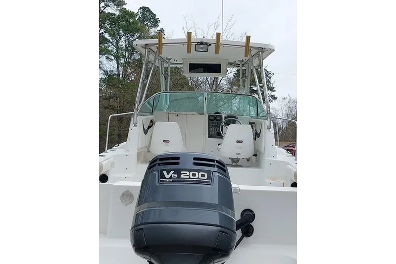 Slide: The Image of 2003 Seaswirl Striper 2301 Walkaround OB with V6 200 engine, rear view. - 4
