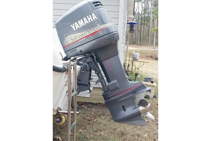 Slide: The Image of Yamaha Saltwater Series II outboard motor on 2003 Seaswirl Striper 2301 Walkaround OB boat. - 6