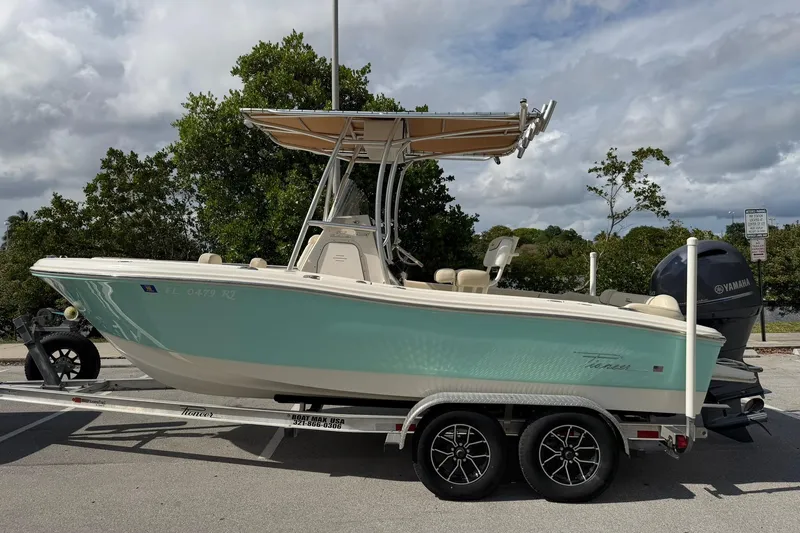 Slide: The Image of 2017 Pioneer 202 Islander boat on trailer, parked outdoors with Yamaha engine. - 6