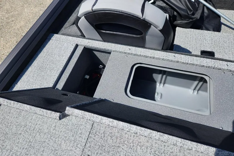 Slide: The Image of 2026 Smoker Craft Viper XR 175 Pro boat interior storage compartments. - 11