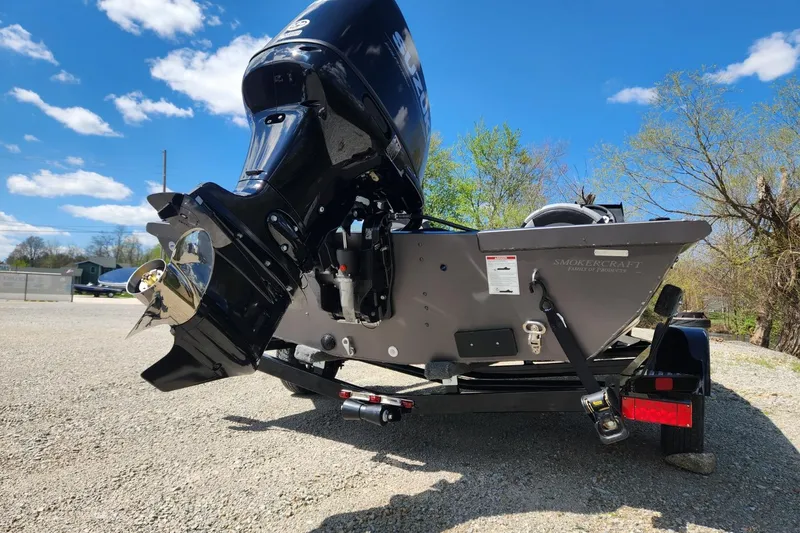Slide: The Image of 2026 Smoker Craft Viper XR 175 Pro boat on trailer, rear view, sunny day. - 6