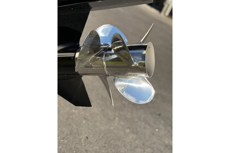 Slide: The Image of 2024 Sea Pro 242 Center Console boat propeller, shiny and metallic. - 8