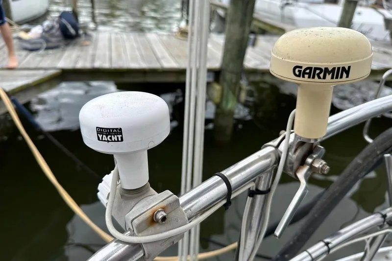 Slide: The Image of Digital Yacht and Garmin antennas on a Hylas 44 sailboat, dockside view. - 20