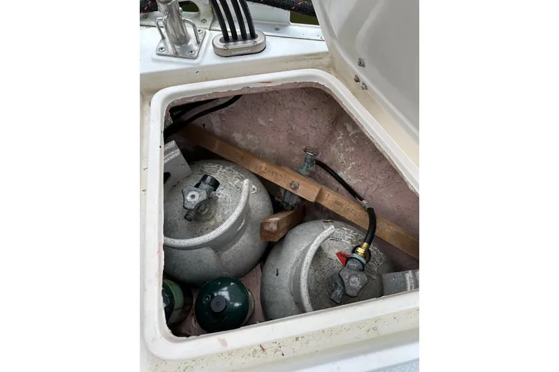 Slide: The Image of Storage compartment with propane tanks on a 1989 Hylas 44 sailboat. - 21