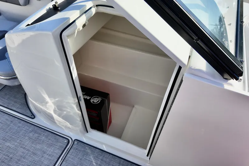 Slide: The Image of Storage compartment in 2026 Bayliner VR6 Bowrider OB boat, featuring sleek design and ample space. - 19