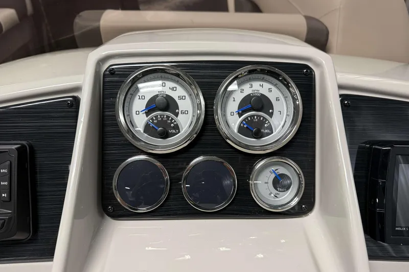 Slide: The Image of Dashboard of 2026 Sylvan Mirage X1 LZ DH boat with gauges and controls. - 10
