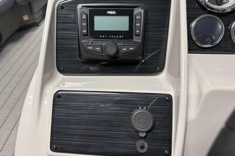 Slide: The Image of Dashboard of 2026 Sylvan Mirage X1 LZ DH with audio controls and gauges. - 11