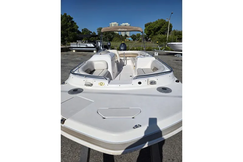 Slide: The Image of 2004 Hurricane FunDeck GS 232 OB boat with spacious seating and sleek design. - 6