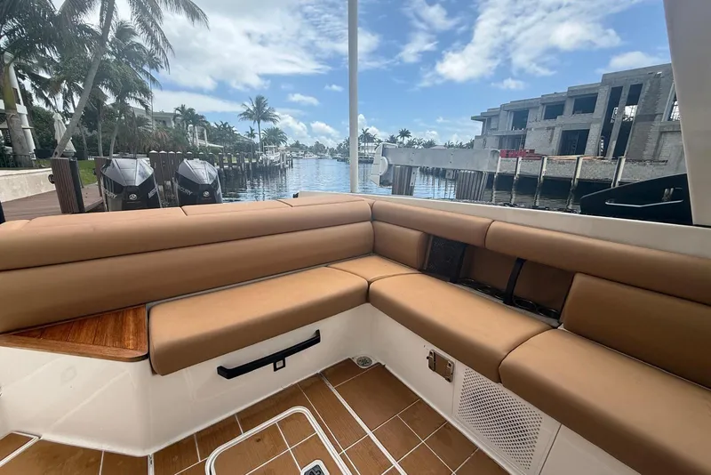 Slide: The Image of 2022 Aviara AV32 OB boat interior with seating, storage, and modern amenities. - 10
