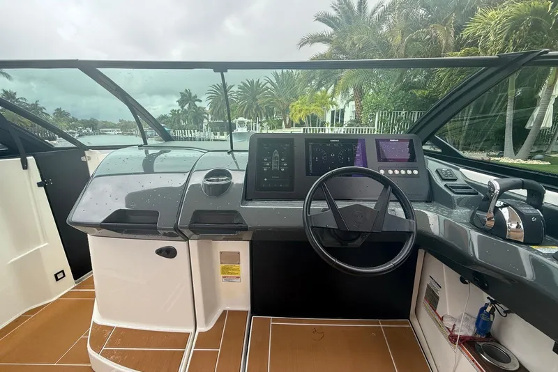 Slide: The Image of Luxurious 2022 Aviara AV32 OB boat interior with tan seating and modern amenities. - 6