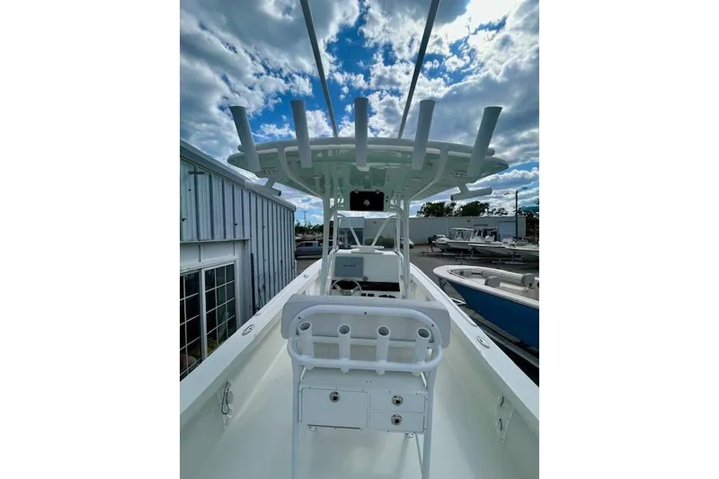 Slide: The Image of 2020 Pair Customs 24 Center Console MV boat under cloudy sky. - 9