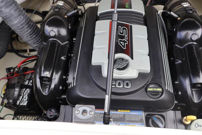 Slide: The Image of Engine of 2018 Larson LX 195 I/O boat, featuring a 4.5L MerCruiser. - 29