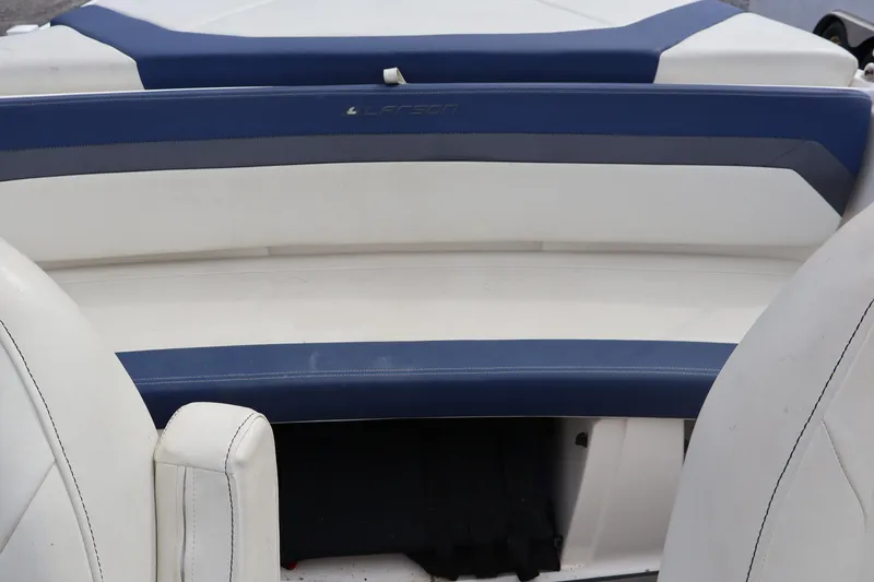 Slide: The Image of 2018 Larson LX 195 I/O boat interior with blue and white seating. - 39
