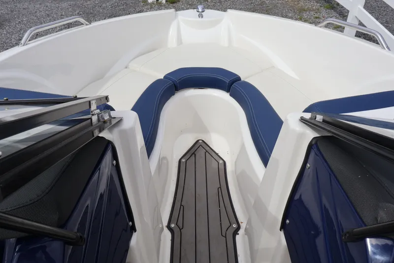Slide: The Image of 2018 Larson LX 195 I/O boat interior with blue and white seating. - 53