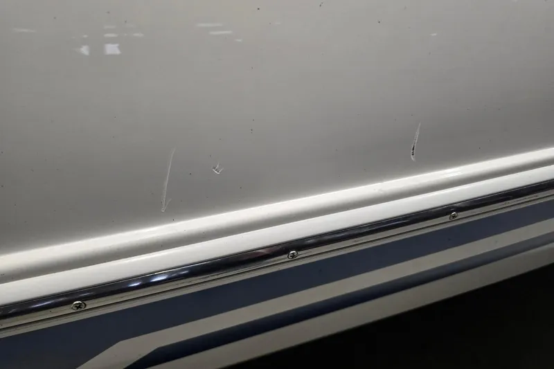 Slide: The Image of 2018 Larson LX 195 I/O boat on trailer, covered, parked at Morgan Marine. - 9