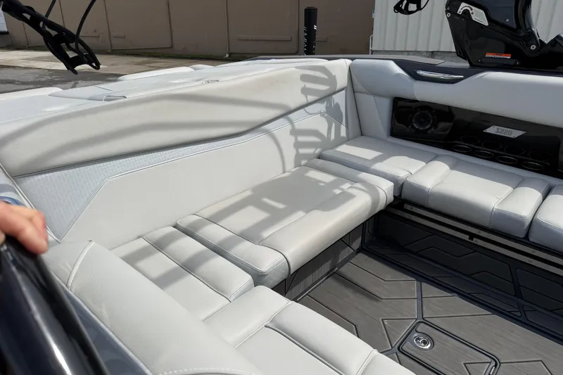 Slide: The Image of Luxurious interior of 2024 Supreme S220 boat with plush seating and modern design. - 11