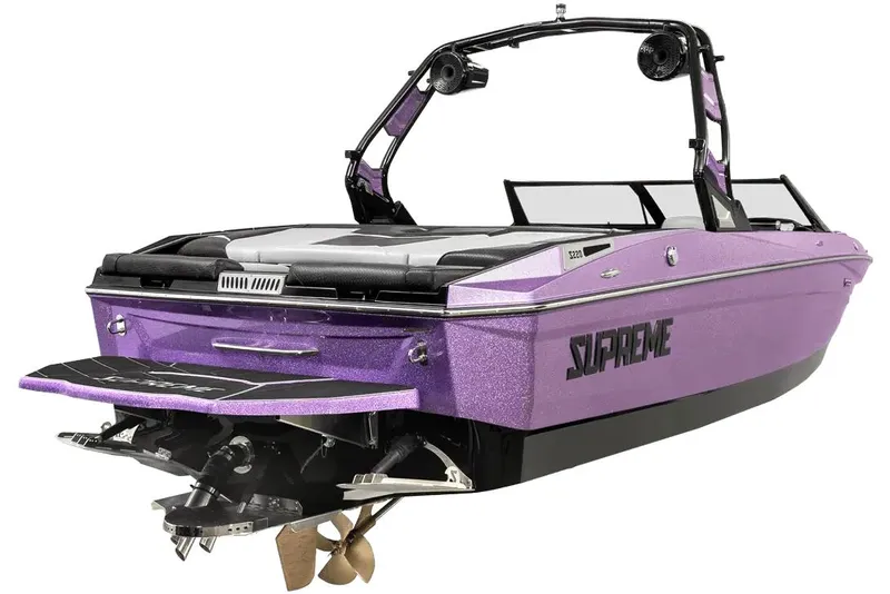 Slide: The Image of Manufacturer Provided Image: 2024 Supreme S220 boat in metallic purple, rear view with wakeboard tower. - 2
