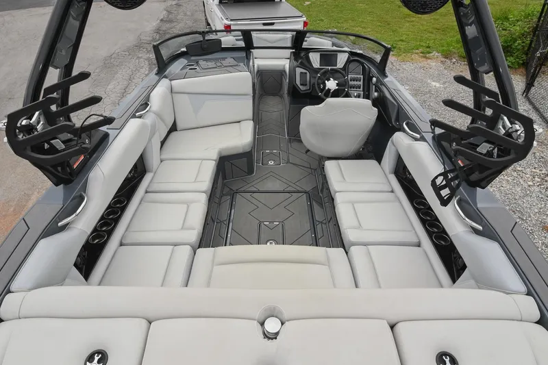 Slide: The Image of 2024 Supreme S220 boat interior with spacious seating and modern design. - 24