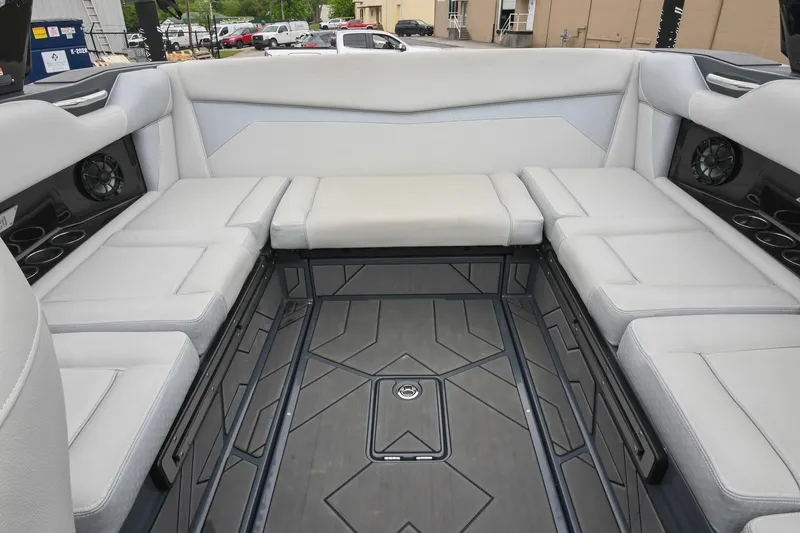 Slide: The Image of 2024 Supreme S220 boat interior with spacious seating and modern design. - 25