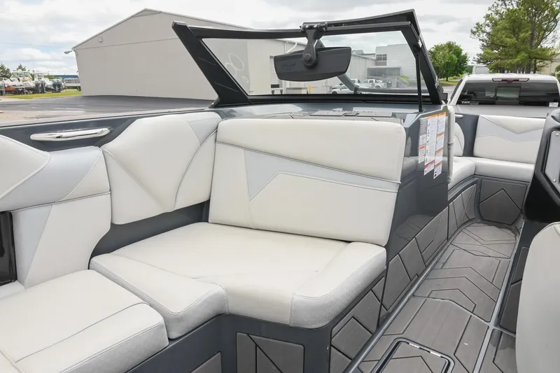 Slide: The Image of 2024 Supreme S220 boat interior with modern seating and sleek design. - 31