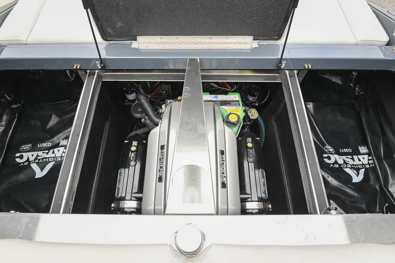 Slide: The Image of 2024 Supreme S220 boat engine compartment showcasing advanced mechanics and design. - 43