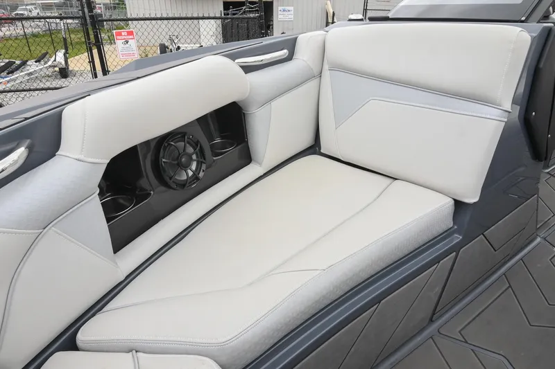 Slide: The Image of Luxurious seating in the 2024 Supreme S220 boat with integrated speaker system. - 44