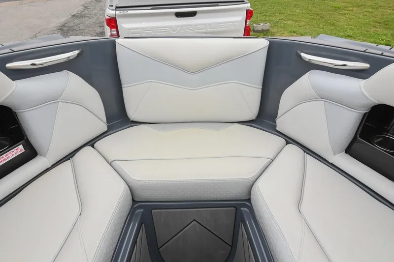 Slide: The Image of Interior of 2024 Supreme S220 boat with gray and white seating. - 46