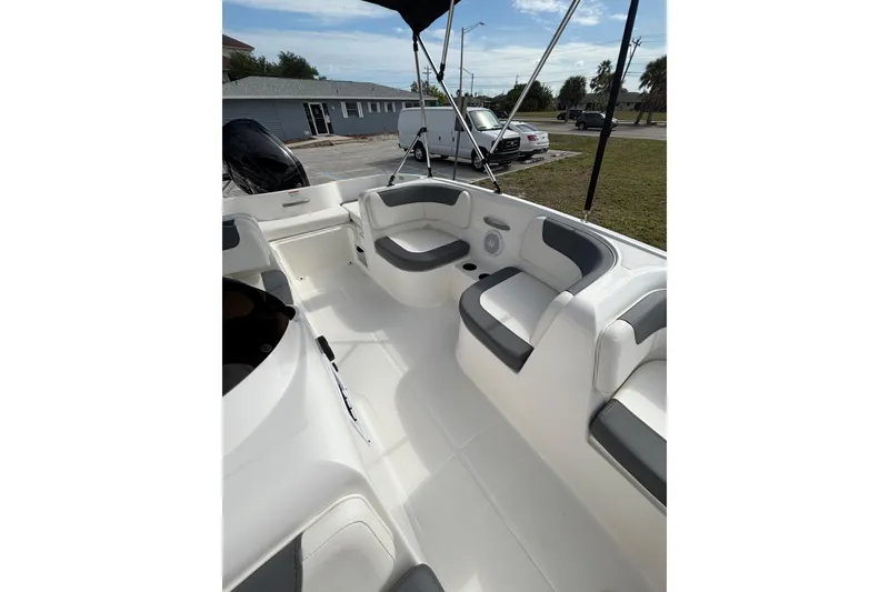 Slide: The Image of 2026 Bayliner Element E16 boat interior with spacious seating and modern design. - 18