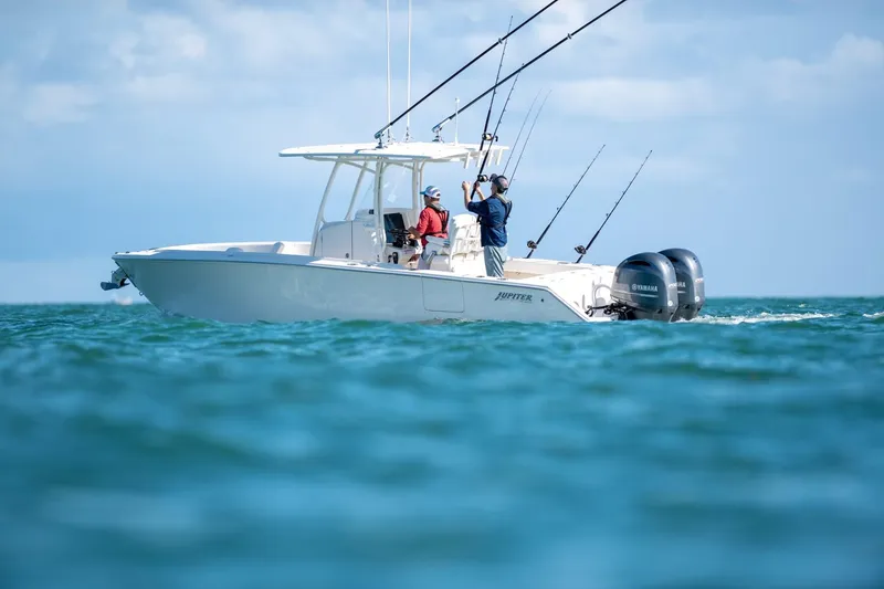 The Image of Fishing on a 2026 Jupiter 26 boat with dual Yamaha engines in open water. - 0