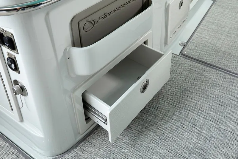 Slide: The Image of 2024 Finseeker by Crownline 280 DC boat interior storage drawer detail. - 14