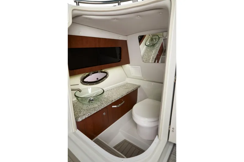 Slide: The Image of Luxurious 2024 Finseeker 280 DC boat bathroom with modern amenities and elegant design, electric flush toilet - 26