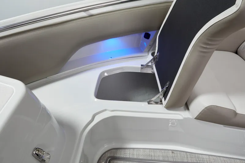 Slide: The Image of 2024 Finseeker by Crownline 280 DC boat interior bow storage compartment and blue LED lighting. - 33