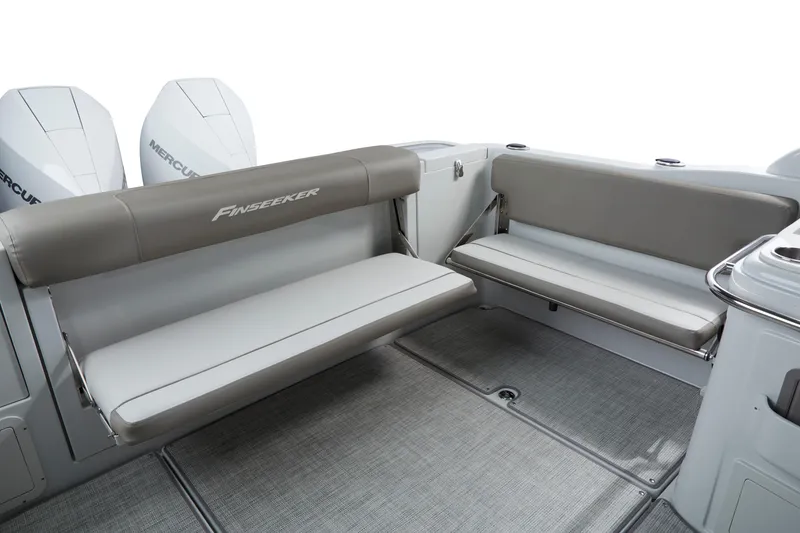 Slide: The Image of 2024 Finseeker by Crownline 280 DC boat interior with comfortable seating and Mercury engines. - 6