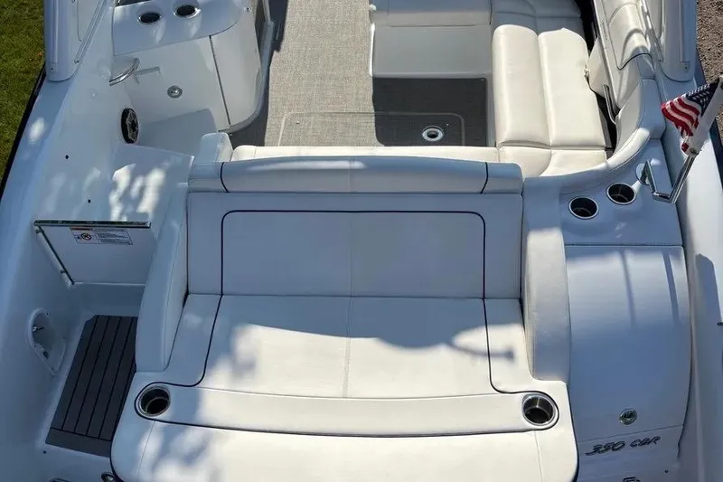 Slide: The Image of 2015 Formula 350 Crossover Bowrider with spacious seating and American flag. - 22