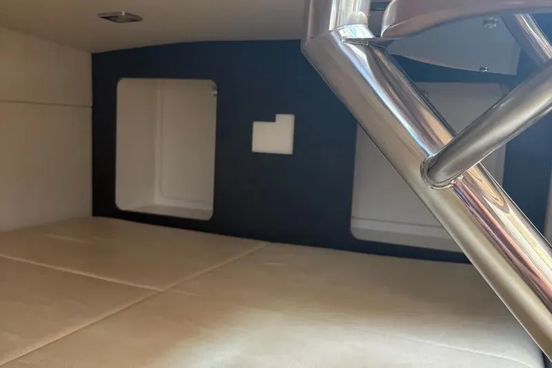 Slide: The Image of Interior cabin view of a 2015 Formula 350 Crossover Bowrider boat. - 26