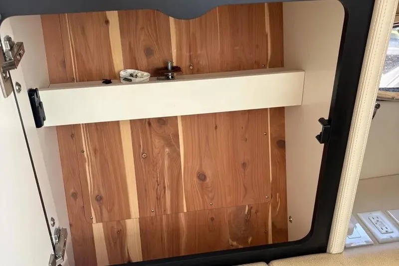 Slide: The Image of Interior view of 2015 Formula 350 Crossover Bowrider with wooden paneling. - 28