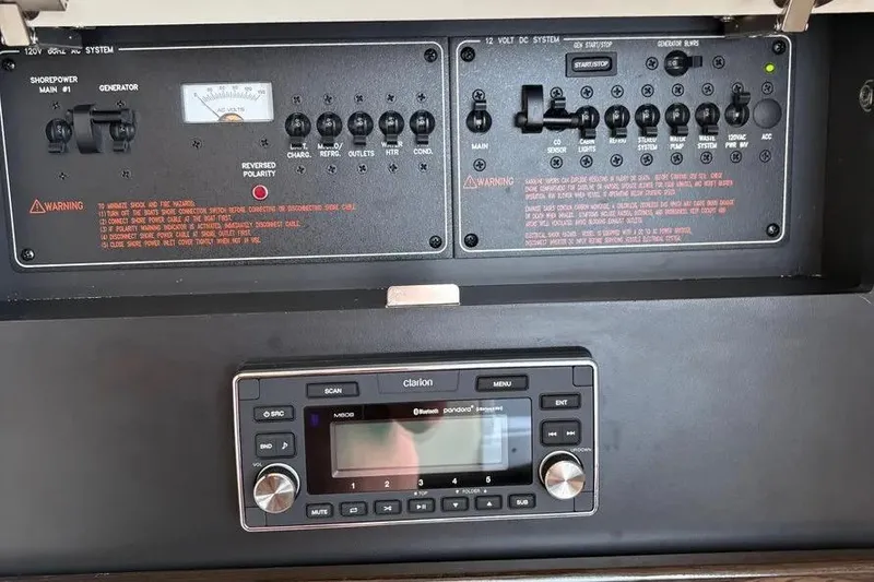 Slide: The Image of Control panel and audio system of a 2015 Formula 350 Crossover Bowrider boat. - 29