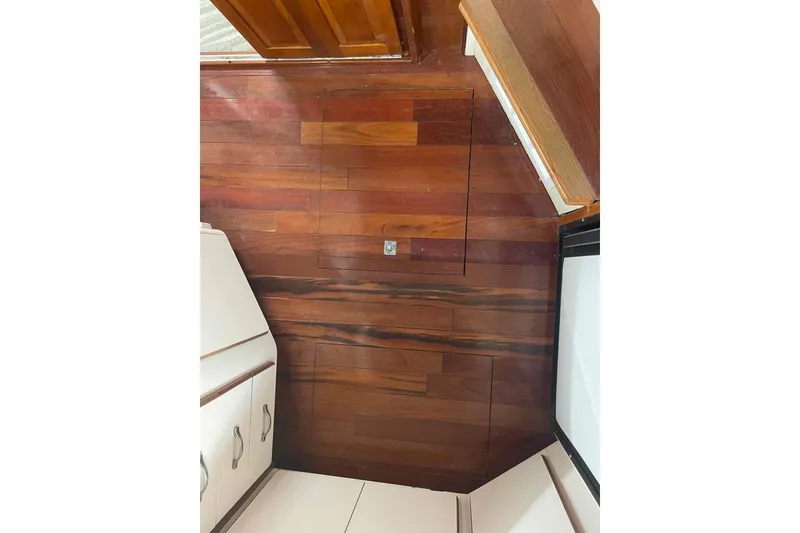 Slide: The Image of Wooden interior flooring of 1989 Sea Ray 380 Aft Cabin yacht. - 16
