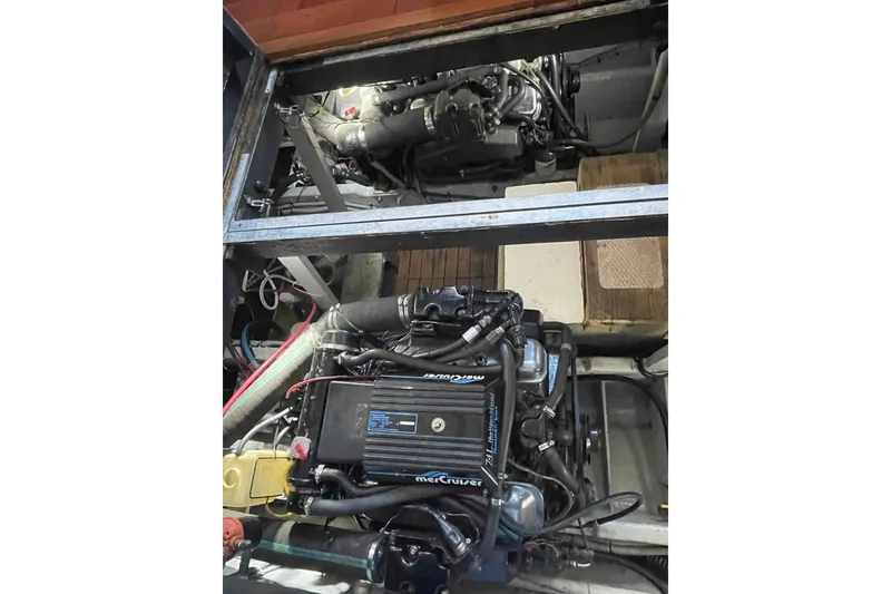 Slide: The Image of Engine compartment of 1989 Sea Ray 380 Aft Cabin with MerCruiser engine visible. - 19