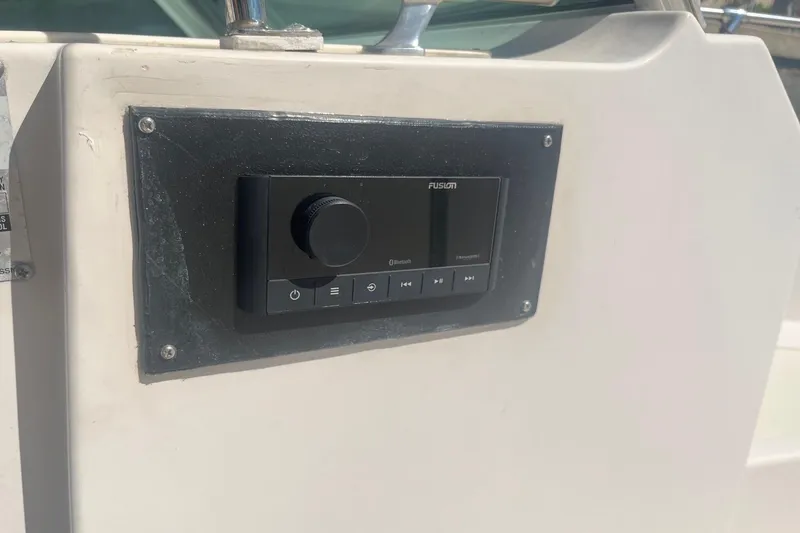 Slide: The Image of Fusion stereo system on 1986 Grady-White Tournament 190 boat dashboard. - 12