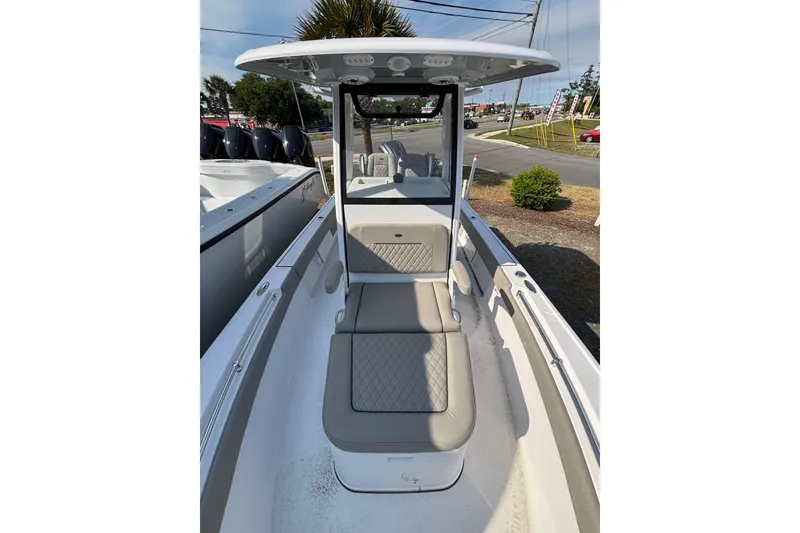 Slide: The Image of 2027 Sportsman Masters 247OE Bay Boat interior with seating and console view. - 21