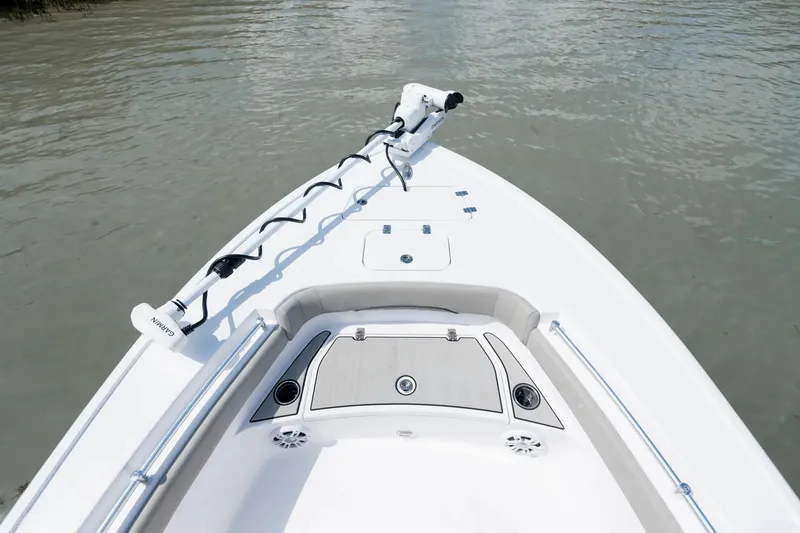 Slide: The Image of Manufacturer Provided Image: 2025 Sportsman Masters 247OE Bay Boat bow view on water. - 5