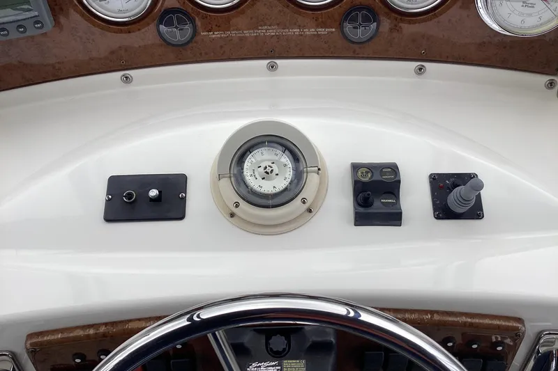 Slide: The Image of Control panel of a 2006 Silverton 38 Sport Bridge with GPS and audio system. - 13