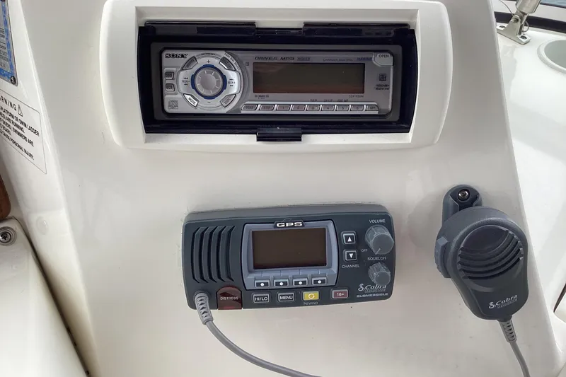 Slide: The Image of Luxurious interior of 2006 Silverton 38 Sport Bridge yacht with elegant wood finishes. - 15