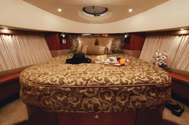 Slide: The Image of 2006 Silverton 38 Sport Bridge yacht docked in Mystic, CT marina. - 2