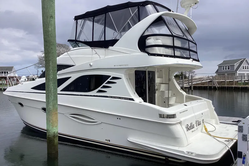 Slide: The Image of Interior cabin of 2006 Silverton 38 Sport Bridge with cozy bedding. - 40