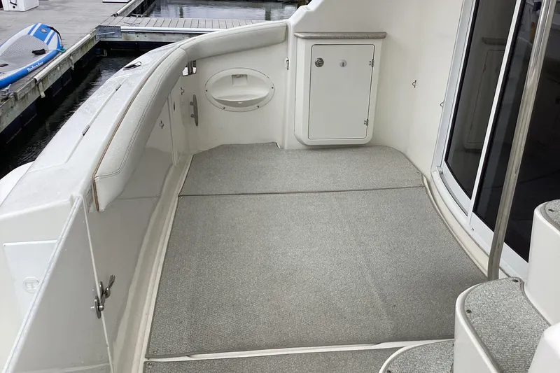 Slide: The Image of White leather seating on a 2006 Silverton 38 Sport Bridge yacht. - 7