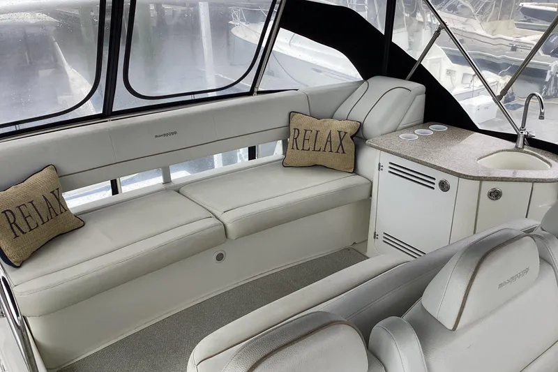 Slide: The Image of Helm of 2006 Silverton 38 Sport Bridge with steering wheel and control panel. - 8